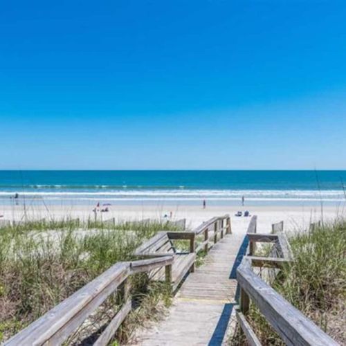 Private beach walkway over the dunes from condos