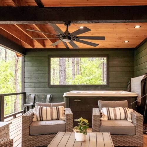 Swivel chairs on the porch for viewing fireplace or tv!