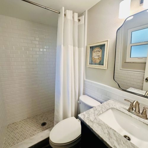 Full bathroom off Kitchen